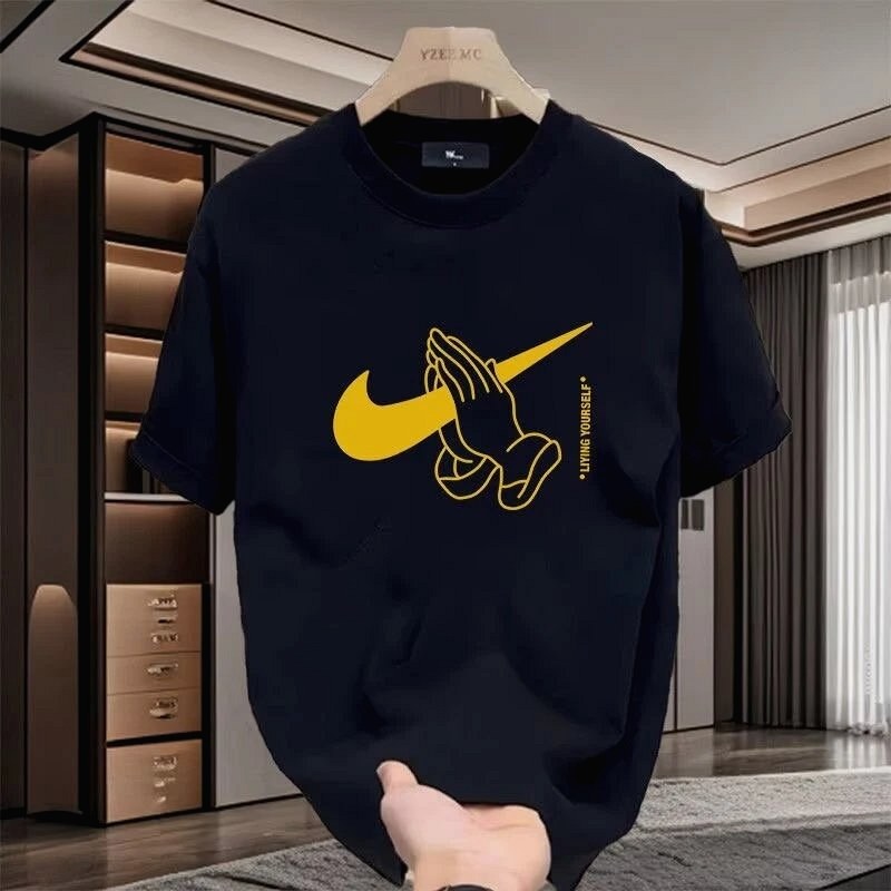 Nike Black Graphic Tee Review: Thirty Print Variants, One Loose Cut, and a Yellow Swoosh Under the Loupe